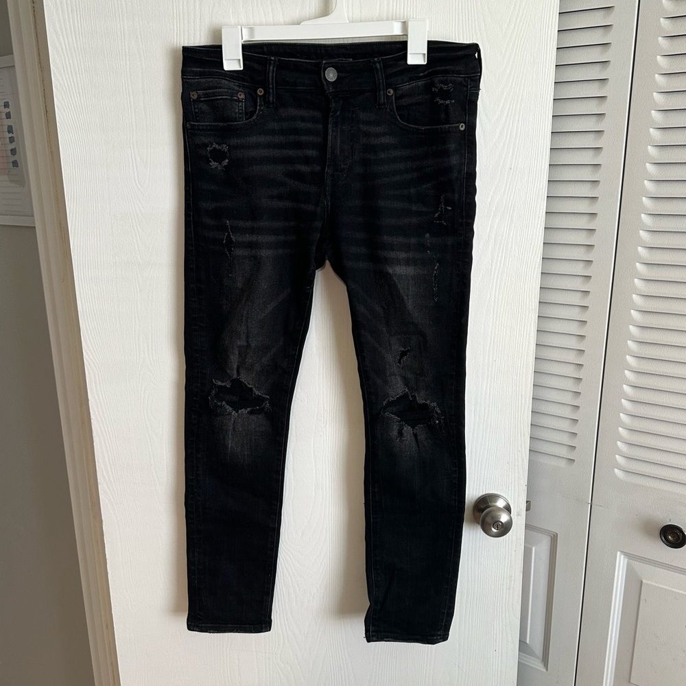 32x30 Next Level Flex American Eagle Jeans, Black With Some Light Wash.